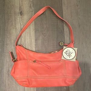 The Sak shoulder leather bag,orange color.Great for any occasion,very soft.